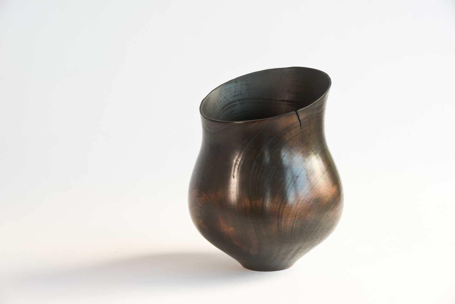 Turned-Wooden-Vessel-BB13-c Hollowed wooden vessel with natural grain showing beneath fire-blackened finish.