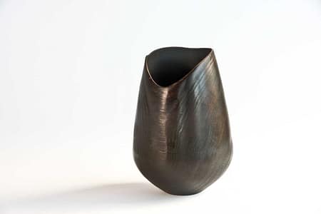 Sculptural vessel textured fire-blackened surface, finished in matte black