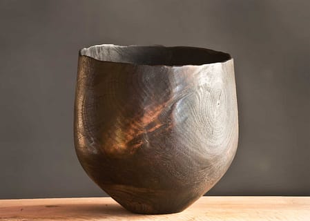 Sculptural vessel, textured fire-blackened surface, finished in matte black.